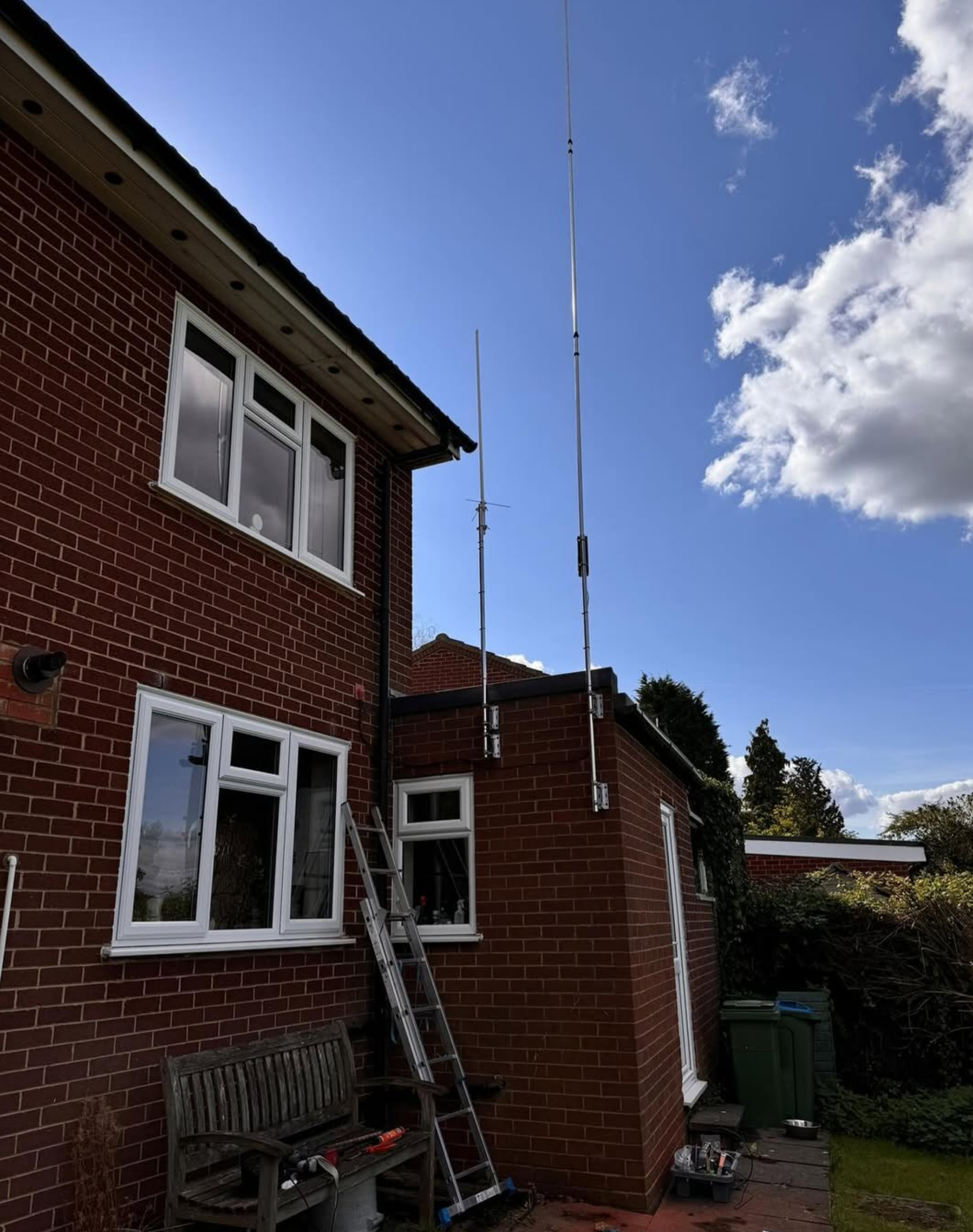 Amateur radio aerial installation on brick house