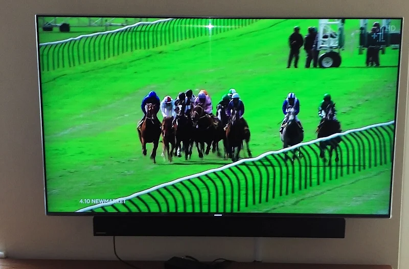 TV and soundbar wall mounted together